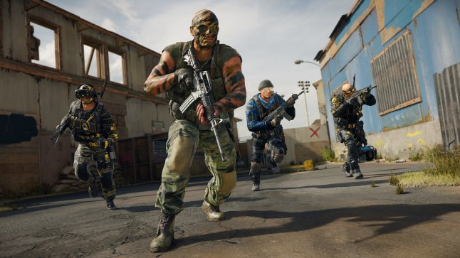 Call of Duty Black Ops 6 soldiers running past abandoned buildings