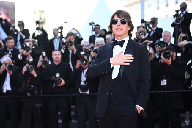 CANNES, FRANCE - MAY 14: Tom Cruise attends the "Mission Impossible - The Final Reckoning" red carpet at the 78th annual Cannes Film Festival at Palais des Festivals on May 14, 2025 in Cannes, France. (Photo by Stephane Cardinale - Corbis/Corbis via Getty Images)