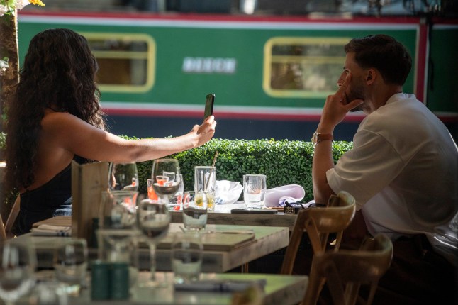 ***EXCLUSIVE ALL ROUND PICTURES*** *****PICTURES EMBARGOED UNTIL 1PM 15h MAY 2025****** Maya Jama & Ruben Dias are seen for the first time in a public display of affection as the dine for a sunny lunch at the Canal Riverside eatery ???The Summerhouse??? Maya & her NEW heartthrob couldn???t keep their hands to theirselves over some food and Ice cream as they flirted for hours at the West London Restaurant. Dressed in a dark revealing dress and flip flop high heels, Maya flaunted her assets and left little to the imagination on her lunch date with the Manchester City Footballer. The couple have tried for months to keep their blossoming romance away for prying eyes but these images show that Maya could have found her love match. Pictured - Maya Jama & Ruben Dias ***EXCLUSIVE ALL ROUND PICTURES**** ***PLEASE CALL/EMAIL FOR ONLINE & PRINT USAGE AND FEES***